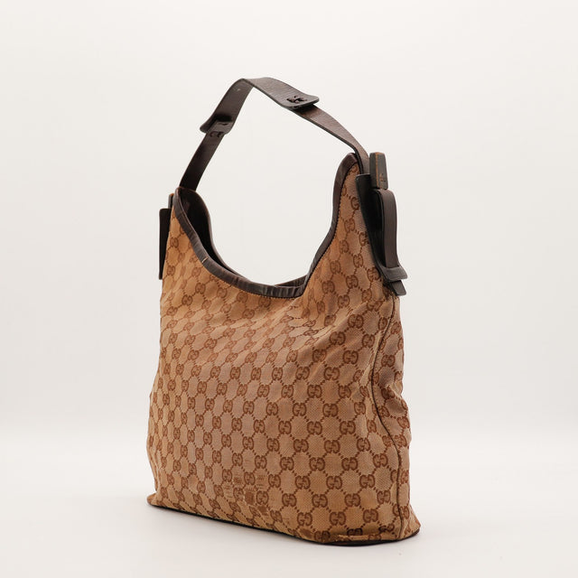 Sac Gucci Hobo toile monogrammée vue de trois quarts occasion authentique — AMANA Vintage
