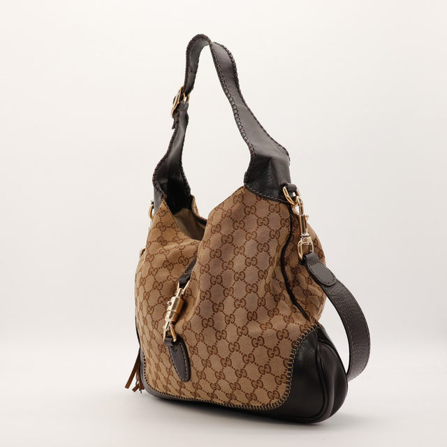 Sac Gucci New Jackie cuir marron vue de profil occasion authentique — AMANA Vintage