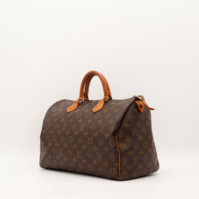 Vue trois quarts Louis Vuitton Speedy 35 Toile Monogramme patine caramel — AMANA Vintage
