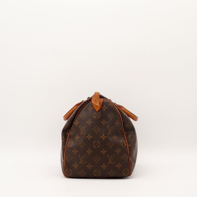 Vue de côté Louis Vuitton Speedy 35 profil droit cuir vachette — AMANA Vintage