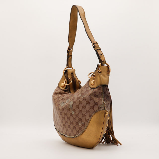 Détail bandoulière Gucci Hobo Babouska cuir doré occasion authentique — AMANA Vintage