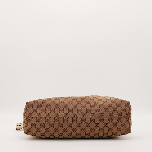 Détail fond toile monogrammée Gucci Hobo Horsebit occasion authentique — AMANA Vintage