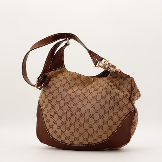 Sac Gucci Hobo fermoir G doré vue de face occasion authentique — AMANA Vintage