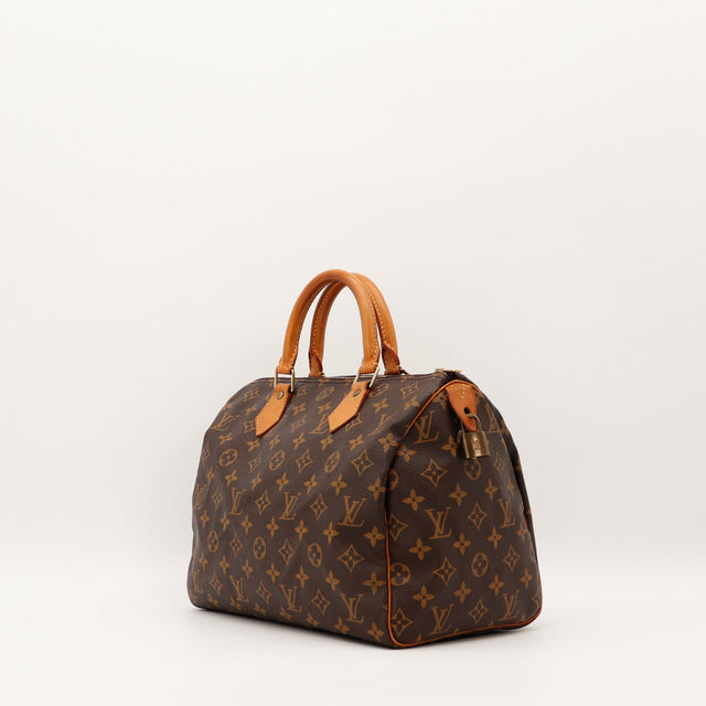 Louis Vuitton Speedy 30 vue de trois quarts patine caramel occasion — AMANA Vintage