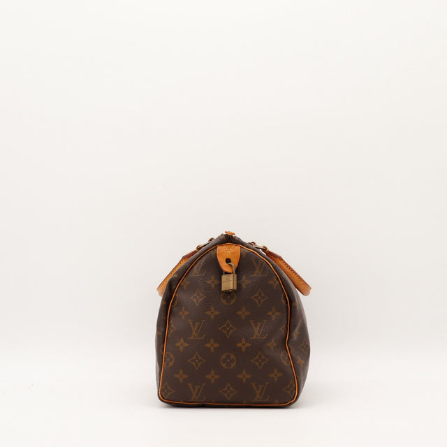 Vue de côté Louis Vuitton Speedy 30 cadenas doré occasion — AMANA Vintage