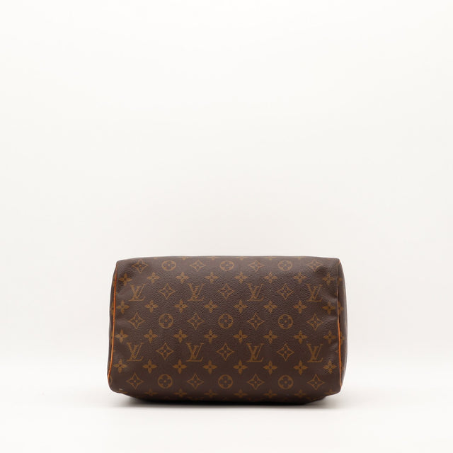 Détail haut Louis Vuitton Speedy 30 anses vachette caramel — AMANA Vintage