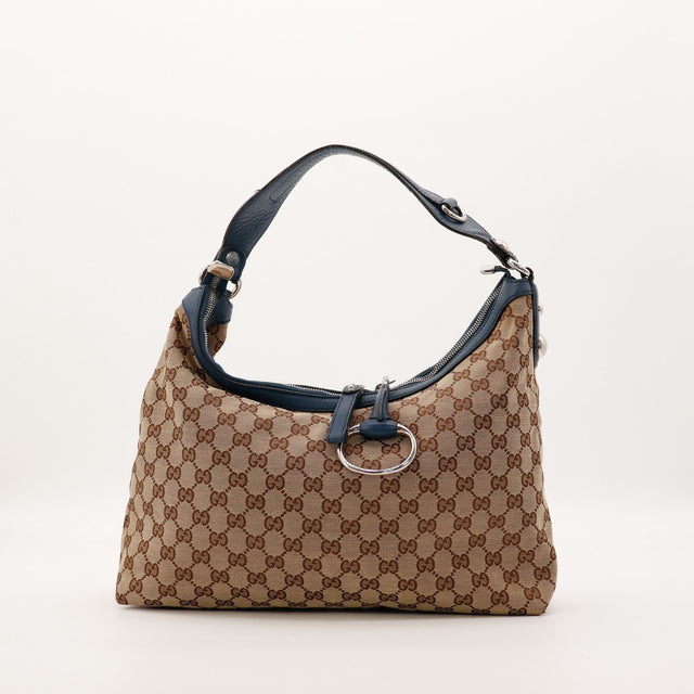 Sac Gucci Hobo toile monogrammee anse cuir bleu marine vue de face occasion authentique — AMANA Vintage