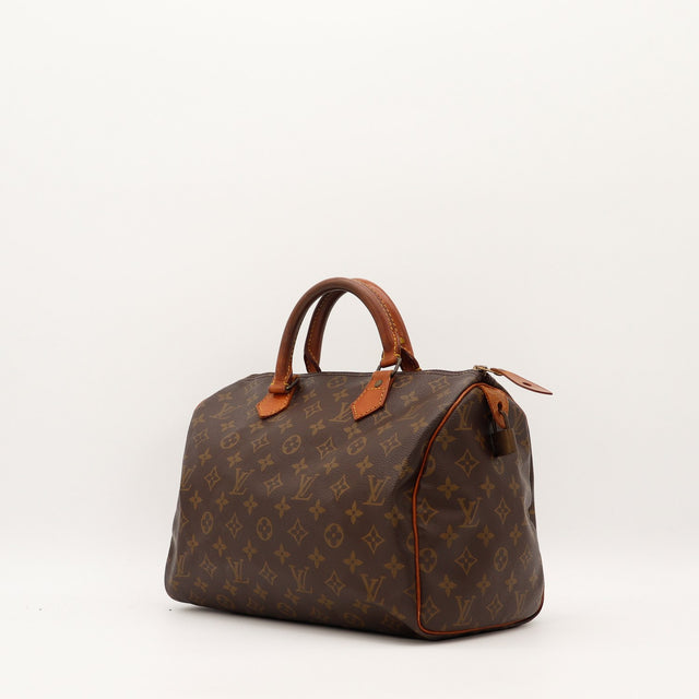 Louis Vuitton Speedy 35 vue de trois quarts patine caramel occasion — AMANA Vintage