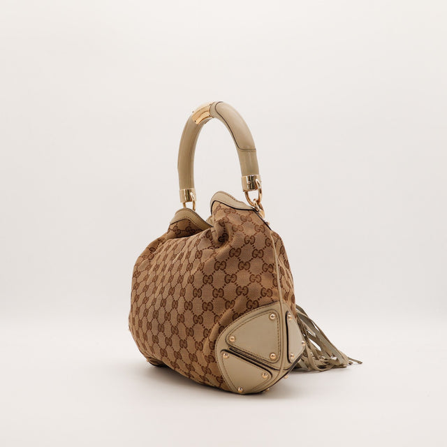 Sac Gucci Indy Hobo détail latéral cuir clouté occasion authentique — AMANA Vintage