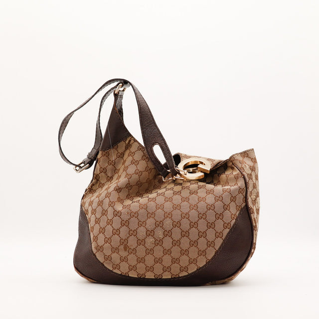 Sac Gucci Hobo GG embout doré G vue trois quarts occasion authentique — AMANA Vintage
