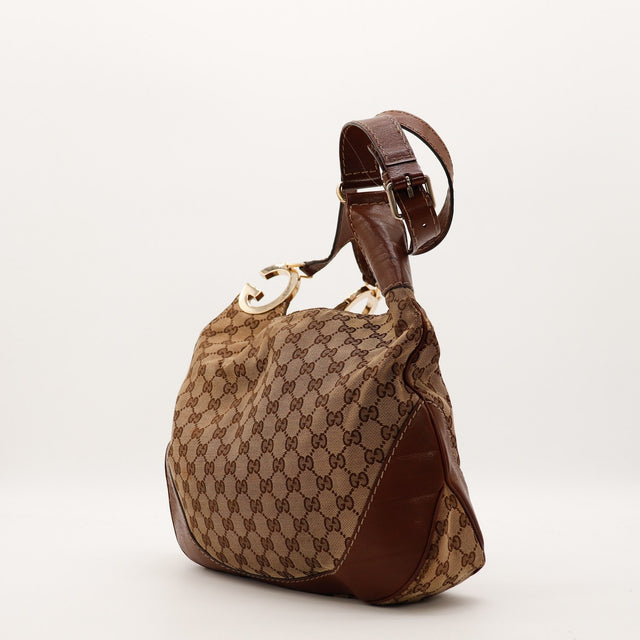 Sac Gucci Hobo toile monogrammée vue de côté occasion authentique — AMANA Vintage