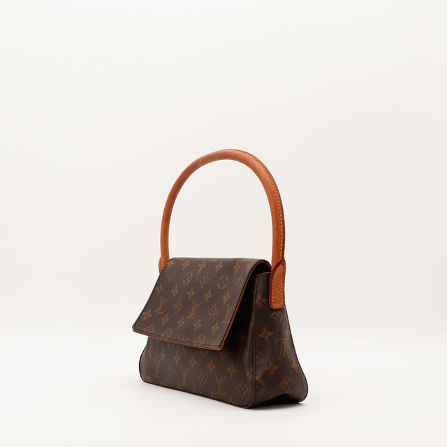 Vue trois quarts gauche Louis Vuitton Mini Looping toile Monogram occasion — AMANA Vintage