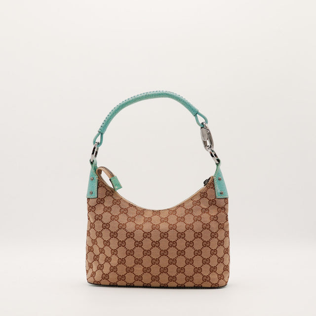 Hobo Gucci toile monogrammée cuir turquoise vue de trois quarts droit occasion — AMANA Vintage