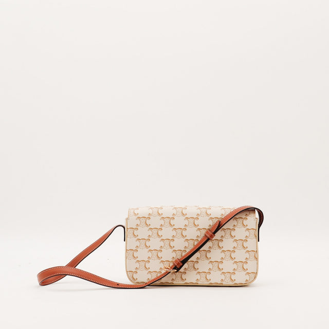 Profil gauche Celine Triomphe toile Triomphe ivoire bandoulière cuir marron — AMANA Vintage