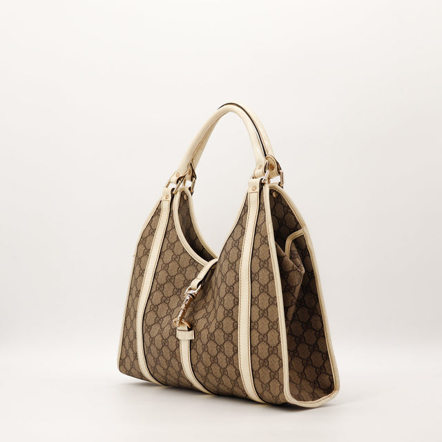 Sac Gucci Hobo GG toile GG Supreme vue de trois quarts — AMANA Vintage