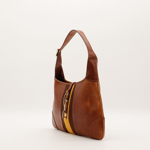 Gucci Hobo Web marron vue de trois quarts gauche bandoulière cuir — AMANA Vintage