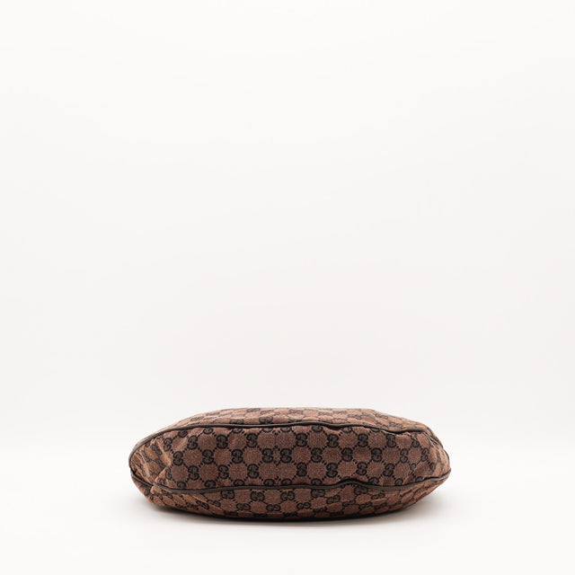 Détail de l'anse en cuir marron du sac Gucci Hobo — AMANA Vintage