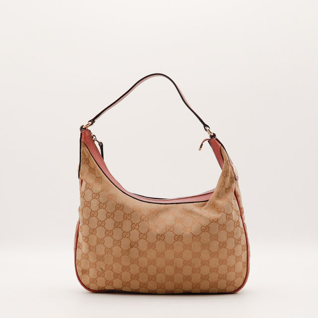 Sac Gucci Hobo toile monogrammée beige et cuir rose vue de face occasion authentique — AMANA Vintage