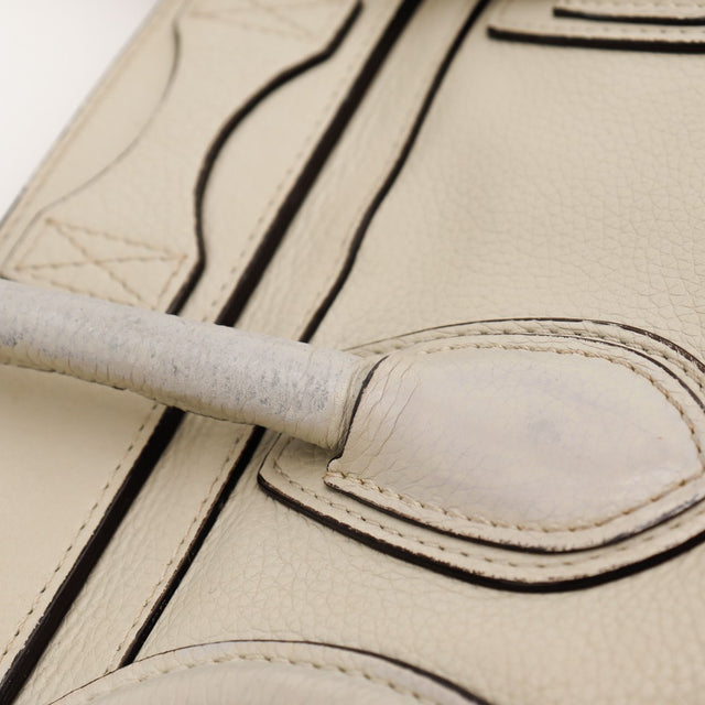 Détail anse Céline Luggage Mini décoloration cuir gris — AMANA Vintage