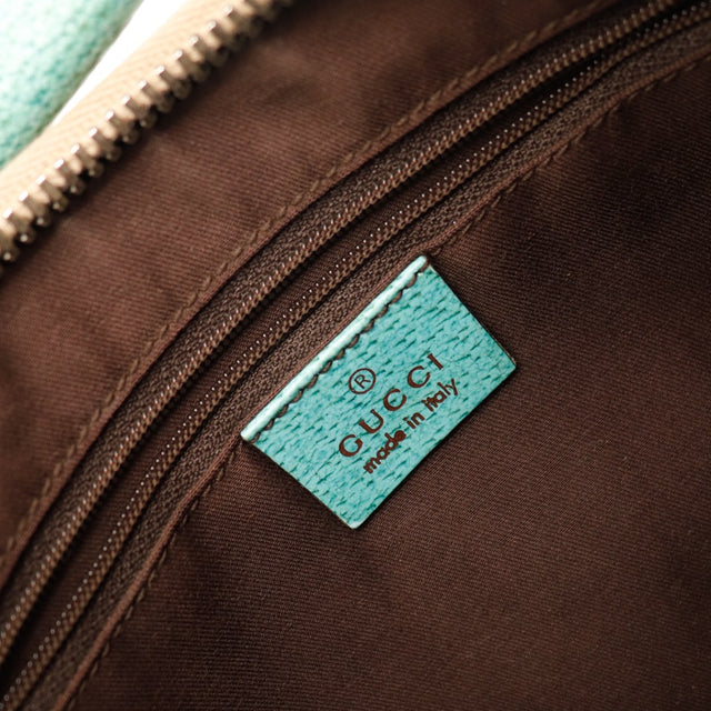 Intérieur doublure marron Hobo Gucci avec étiquette cuir turquoise — AMANA Vintage