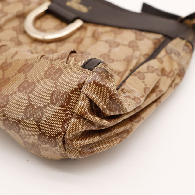 Détail coin et toile frottée Gucci Hobo — AMANA Vintage