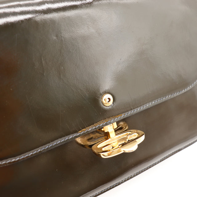 Détail cuir verni noir Celine Sulky rivet doré — AMANA Vintage