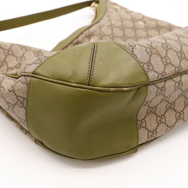 Détail empiècement cuir vert Gucci Hobo occasion authentique — AMANA Vintage