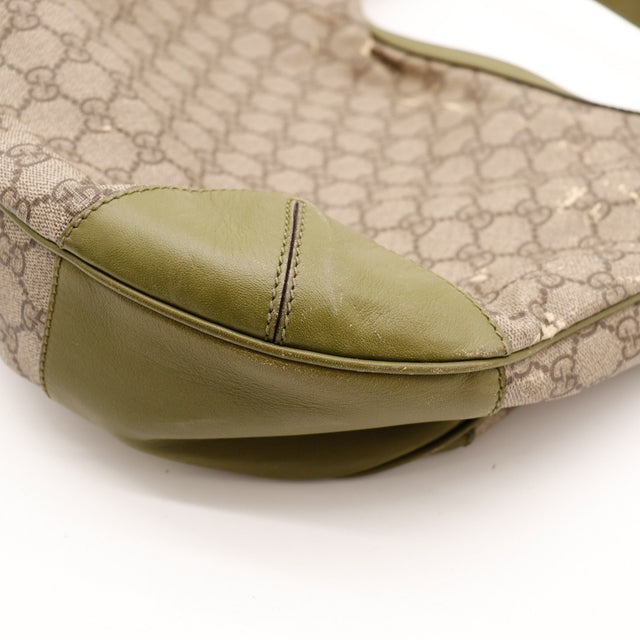 Détail coin cuir vert Gucci Hobo occasion authentique — AMANA Vintage
