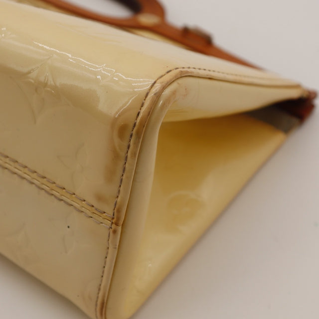 Vue d'ensemble du sac Louis Vuitton Roxbury Drive cuir Vernis Monogram perle — AMANA Vintage