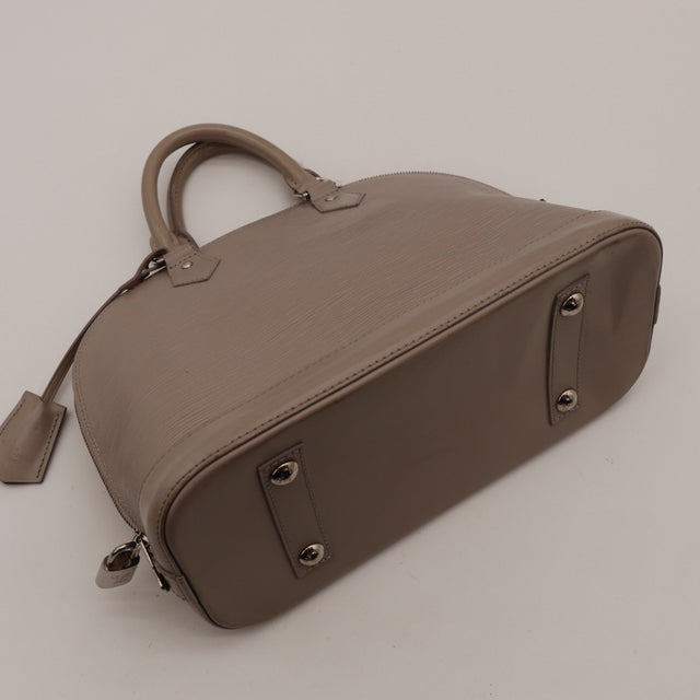 Intérieur du sac Louis Vuitton Alma PM cuir Épi taupe occasion authentique — AMANA Vintage