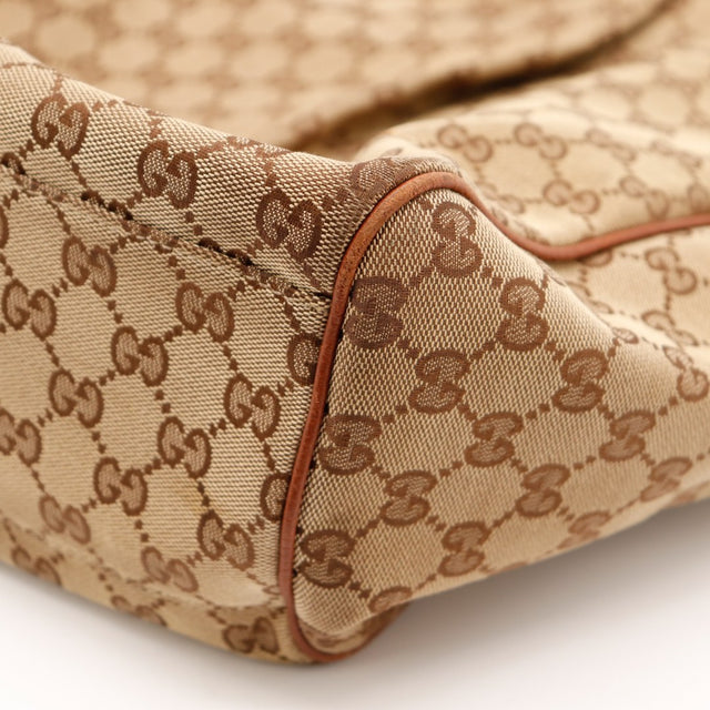 Detail base et coins toile monogrammée Gucci Sukey — AMANA Vintage