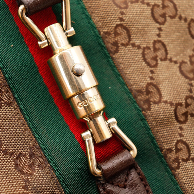 Détail fermoir signature Gucci Jackie occasion authentique — AMANA Vintage