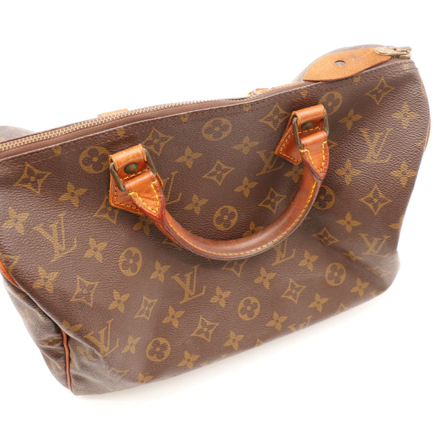 Vue trois quarts Speedy 35 Louis Vuitton anses cuir assombri occasion — AMANA Vintage