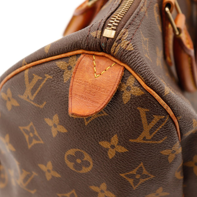 Détail tirette et zip Louis Vuitton Speedy 30 cuir vachette patiné — AMANA Vintage
