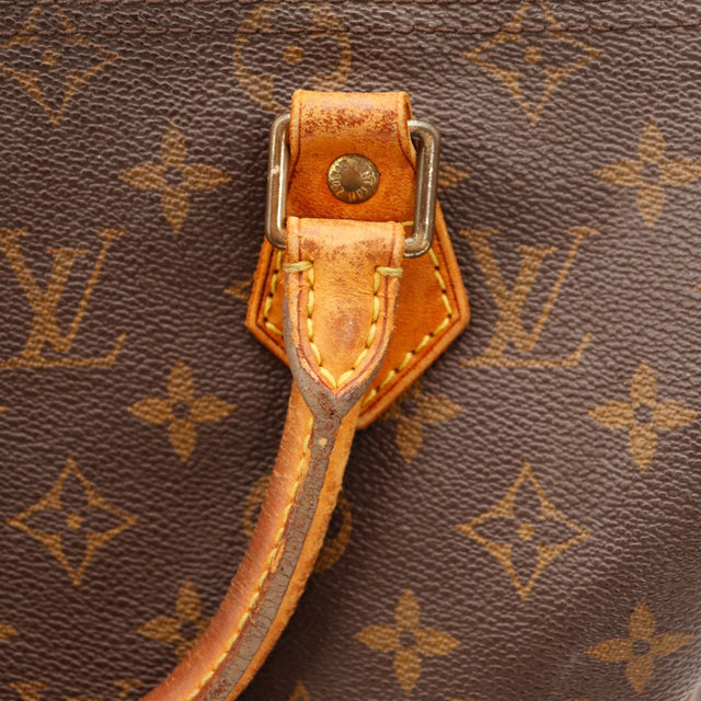 Détail tab anse vachette patiné Louis Vuitton Speedy 25 — AMANA Vintage