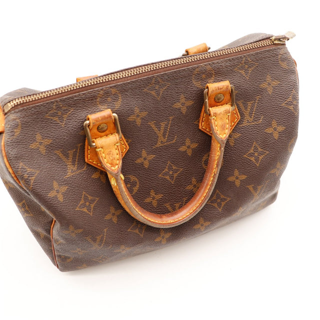 Détail anse vachette patinée Louis Vuitton Speedy 25 Monogramme occasion — AMANA Vintage