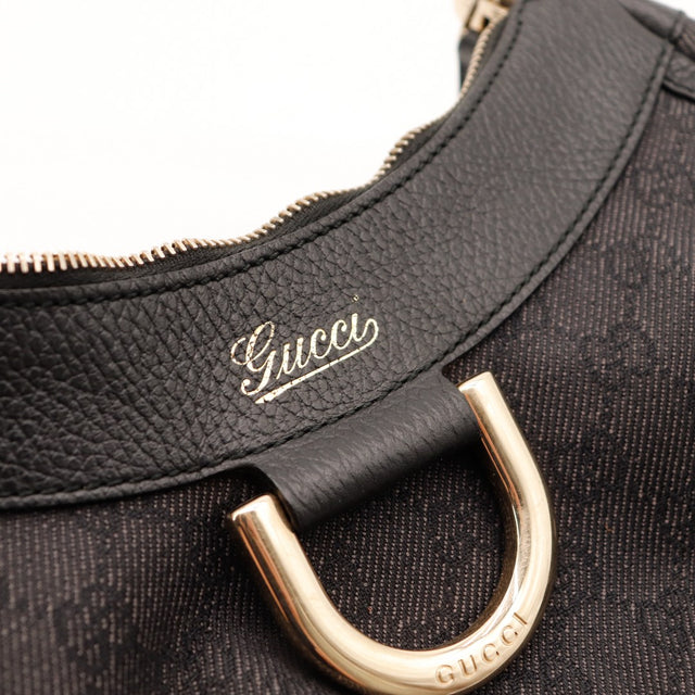 Détail cuir grainé et anneau métallique Gucci Hobo D-Ring occasion authentique — AMANA Vintage