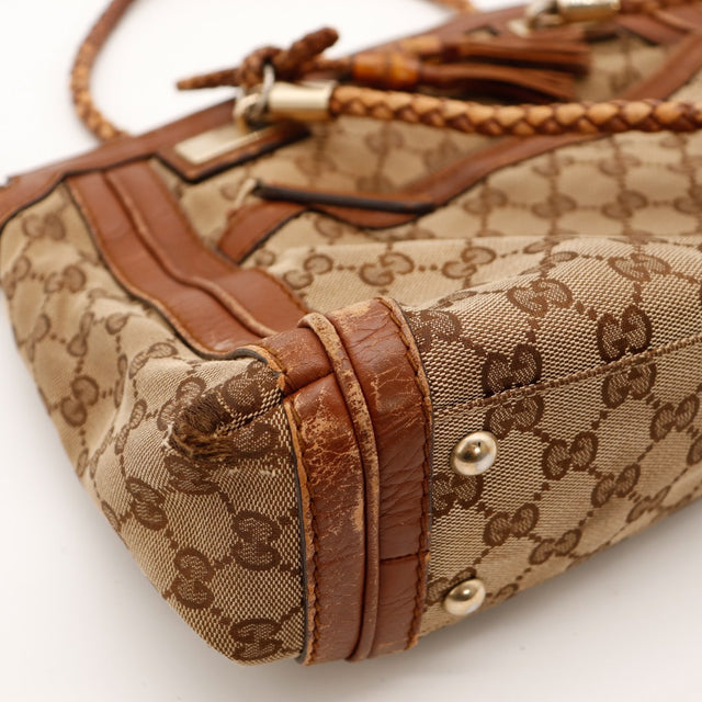 Détail usure cuir des bords Gucci Tote Bag Bamboo occasion authentique — AMANA Vintage