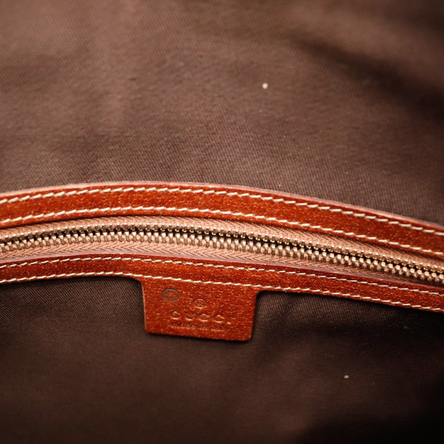 Detail interieur et zip Gucci Hobo Bamboo signature occasion authentique — AMANA Vintage