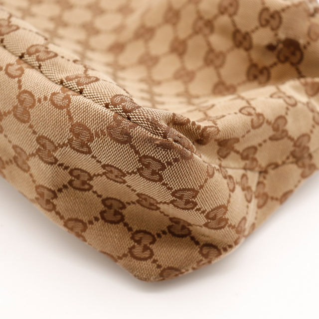 Détail base et coins Gucci Hobo Horsebit occasion authentique — AMANA Vintage