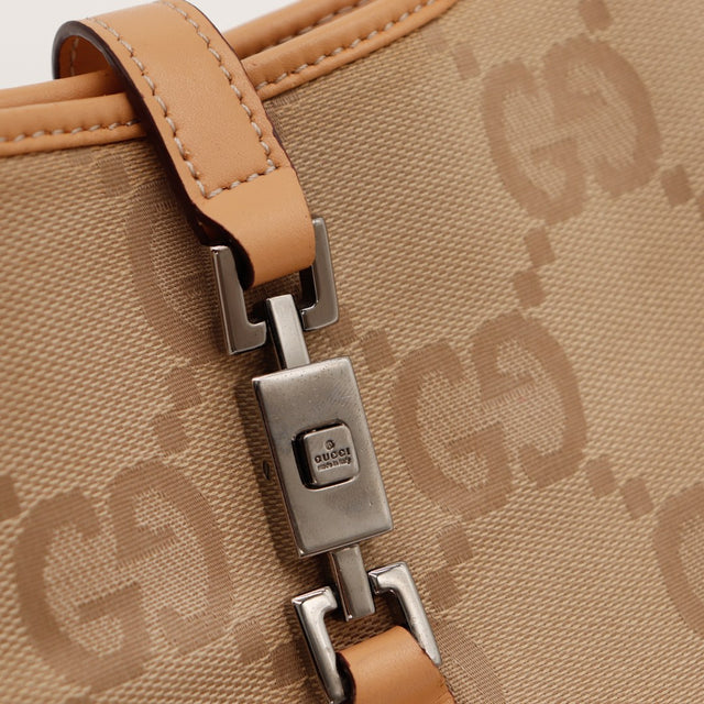 Détail fermoir piston argenté Gucci Jackie — AMANA Vintage