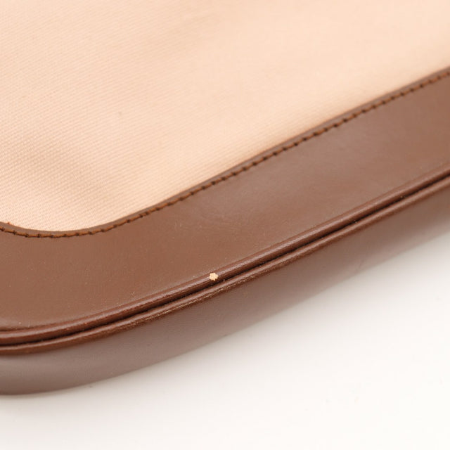 Détail cuir marron du bas du sac Gucci Jackie occasion authentique — AMANA Vintage