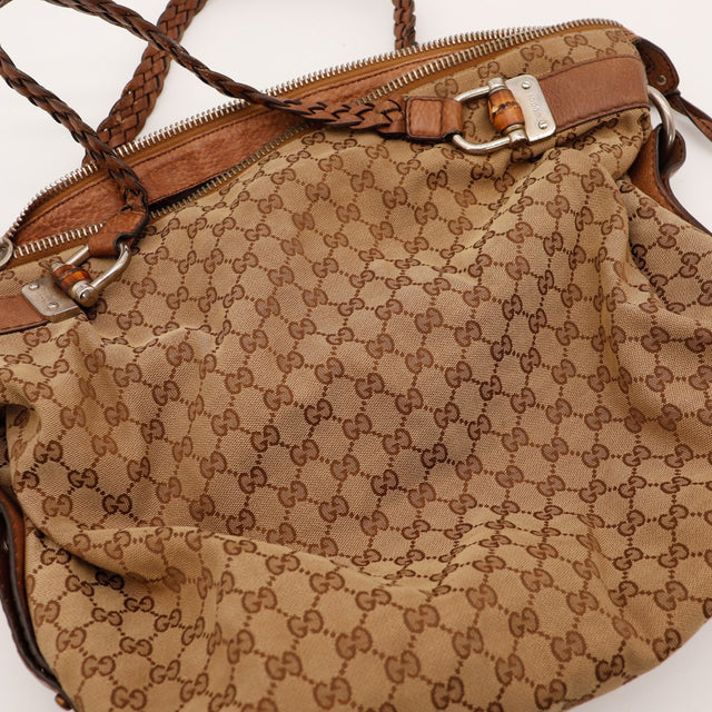 Détail anses tressées et zip Gucci Hobo Bamboo occasion authentique — AMANA Vintage