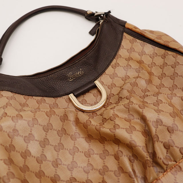 Détail fermoir D-Ring doré Gucci Hobo occasion authentique — AMANA Vintage