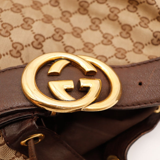 Detail boucle GG dorée Gucci Hobo GG occasion authentique — AMANA Vintage