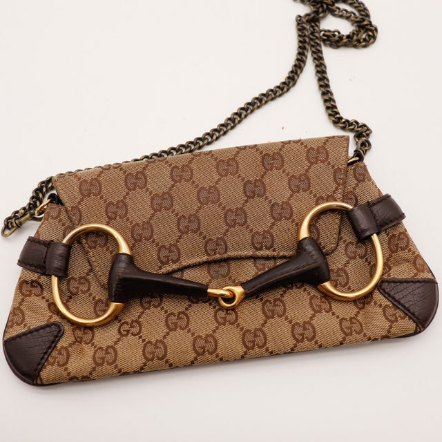 Detail mors doré Gucci Horsebit Chain cuir marron occasion authentique — AMANA Vintage
