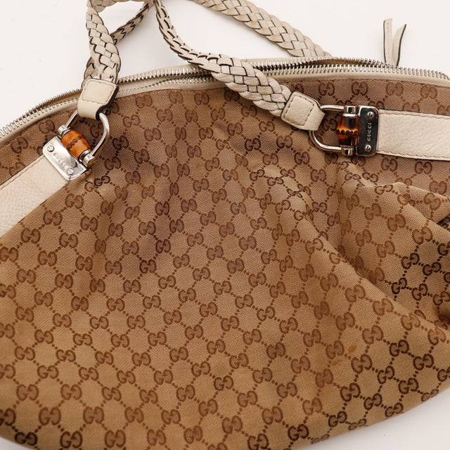 Détail anses tressées et embouts bambou Gucci Hobo occasion authentique — AMANA Vintage