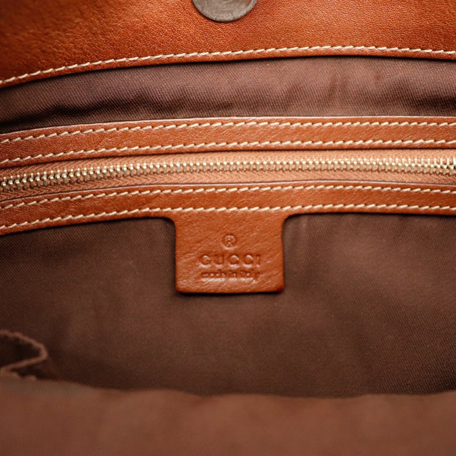 Intérieur Gucci Hobo doublure textile et plaque Gucci Made in Italy — AMANA Vintage