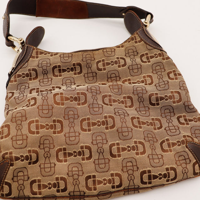 Détail toile monogrammée Gucci Hobo Horsebit occasion authentique — AMANA Vintage