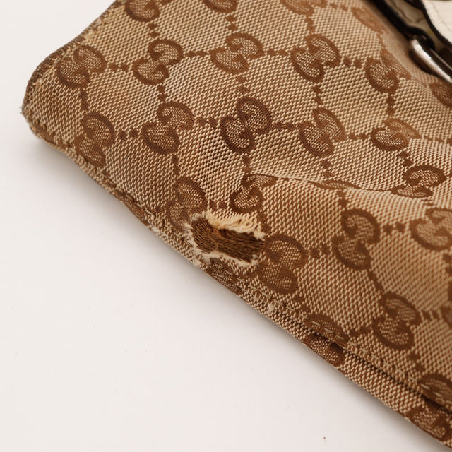 Detail trou dans la toile au coin Gucci Tote Bag occasion authentique — AMANA Vintage